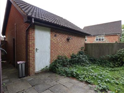 Double garage and driveway